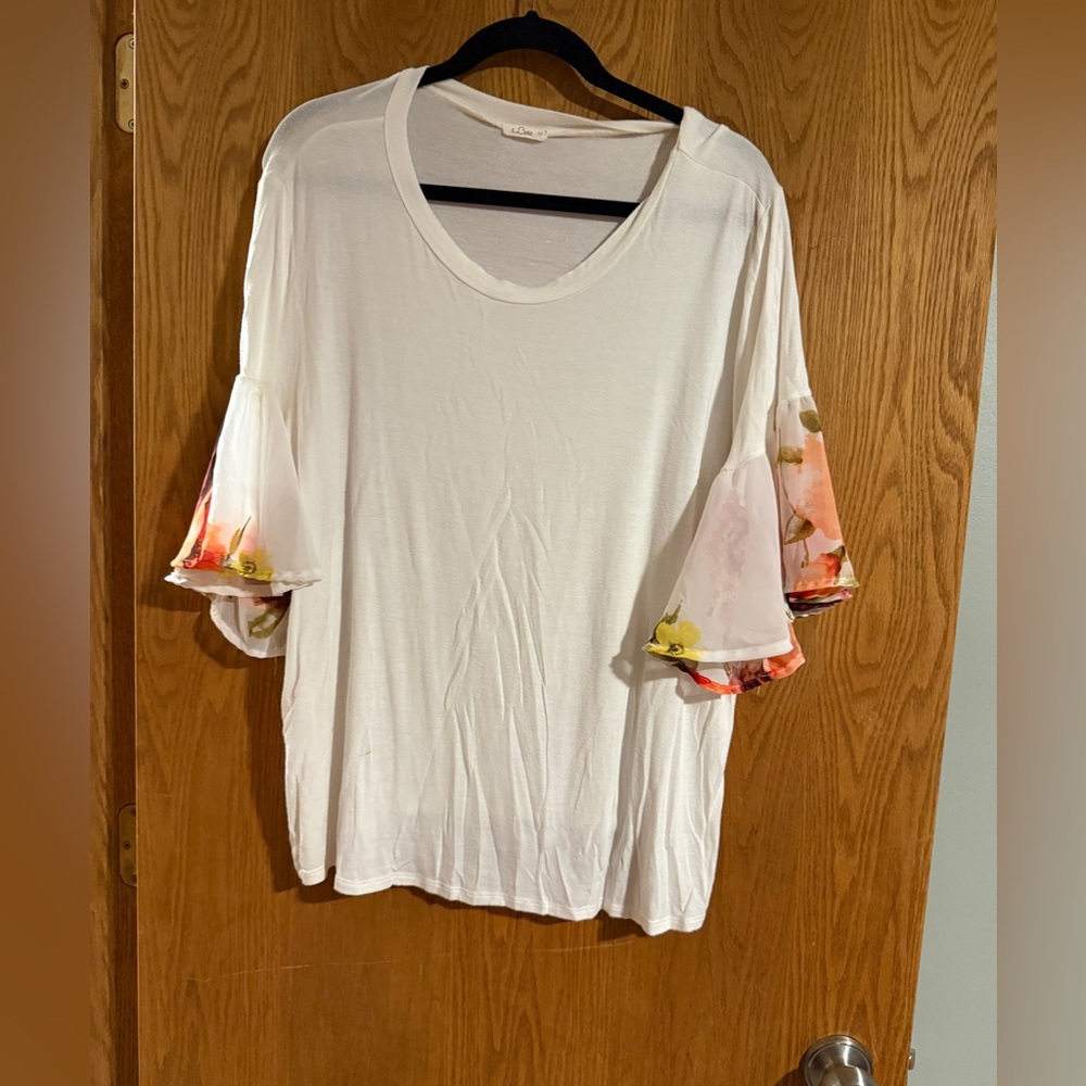 Elegant White Blouse with Floral Accents